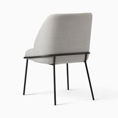 a gray chair with black legs on a white background, the seat is upholstered