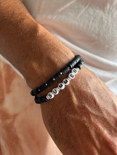 Two Black Beaded Summer Bracelets for Men that are made from unique beads and silver metal parts. The first bracelet is black with silver parts and the second one has the same beads and white letters that create the word ''SUMMER''. Choose between four different dimensions. You can wear them together as set or separetely. Find them only at Christina Christi Store. MATERIALS - Metal Beads. - Caoutchoyk and Plastic Beads. - Elastic Cord. DIMENSIONS - You can choose four different dimensions for yo Friendship Bracelets Men, Men Beaded Bracelet Ideas, Black Beaded Bracelet, Gold Bracelet Simple, Bracelets Men, Men Bracelets, Beach Bracelet, Summer Bracelet, Beads Ideas