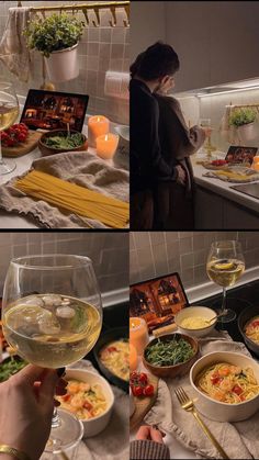 the woman is enjoying her meal in the kitchen with wine and food on the table