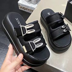 Platform Beach Slides: Women's Summer Style - true-deals-club Casual Black Platform Slippers With Chunky Platform, Trendy Black High Heel Platform Slippers, Black Platform Slippers With Thick Bottom For Spring, Black Chunky Platform Slippers For Summer, Trendy Platform Slip-on Slides, Trendy Chunky Platform Slip-on Slippers, Black Platform Slides For Summer, Trendy Black Slide Wedge Sandals, Trendy Chunky Platform Slide Sandals