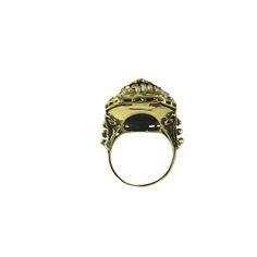 10 Karat Yellow Gold Onyx and Seed Pearl Ring Size 7  This elegant ring features one oval onyx stone (14 mm x 12.5 mm), 36 seed pearls and one clear stone set in meticulously detailed 10K yellow gold.    Top of ring measures 24 mm x 19 mm.  Shank: 2.5 mm.  Tested 10K gold.  Ring Size: 7  Weight:  7.5 dwt. /  11.7 gr.  Very good condition, professionally polished.  Will come packaged in a gift box or pouch (when possible) and will be shipped U.S. Priority Mail Insured. Formal Gold Cabochon Signet Ring, Luxury Gold Opal Ring Oval Cabochon, Luxury Gold Opal Ring With Oval Cabochon, Luxury Gold Oval Cluster Ring, Gold Multi-stone Opal Ring With Oval Cabochon, Victorian Gold Signet Ring With Gemstone, Antique Gold Cluster Ring With Multi-stone, Luxury Gold Multi-stone Opal Ring, Formal Multi-stone Oval Cabochon Rings