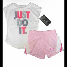 You Are Looking At A Brand New With Tag Nike Dri-Fit Girls Athletic Cut Tee Shirt & Dri- Fit , Fully Lined Shorts . Set 2 Pieces Tee Shirt Style :26d067-001 Color: White 100% Polyester Shorts: Style: 26d186-A9y Color: Pink Foam 100% Polyester Size: 2t A Cool Graphic Nike Tee And Stylish Nike Shorts Make This Nike Set An Easy Choice To Pull Together For Her Active Days. Available In Toddler Girls Size 2t Tee: Athletic Cut The Nike Tee, Short Sleeve, Cool Graphic On Front And 100% Polyester Shorts White Short Top For Playwear, White Nike Playwear Sets, White Nike Summer Sets, Nike White Summer Sets, Playful White Nike T-shirt, Nike White Short Sleeve Sets, Cut Tee Shirts, Nike Set, Nike Swoosh Logo