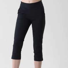 Brand New !! Excellent Condition!!The Katie Is Our Bestselling Women's Golf Pant. Capri-Style Length Hits Right Below The Knee And A Nylon-Spandex Fabric Blend Is Lightweight And Ultra-Comfortable. The Katie's Versatile, Classic Style Makes Them Well Suited For Off The Golf Course, Too. Available In Four Neutral Colors, These Bottoms Are A Comfy Addition To Any Outfit. Black Stretch Pants, Short Length, Fitted Capri Length Bottoms For Work, Black Stretch Pants With Short Length, Black Stretch Pants Short Length, Black Short-leg Pants For Workwear, Black Short Leg Pants For Work, Black Workwear Pants With Short Leg, Black Workwear Cropped Pants, Fitted Workout Pants Short Length