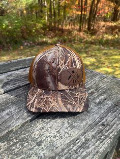 This hat comfortable, fits most with easy to adjust.  This hat is custom designed, engraved and placed on the hat with precision.  Hat Description:  100% polyester, twill Green Camo & Desert Camo are 97/3 cotton/ PU spandex, 100% polyester mesh back Structured, six-panel, mid pro profile Pre-curved bill Adjustable snapback closure COLOR: Realtree MAX 7 / BUCK  CARE OF the HAT: patches shouldn't be cleaned at all but if need to sponge can be used slightly using little water. hat inside and sweatband area can be cleaned with mild detergent. spot clean. hard to get rid of areas a soft brush can be used. never put hat in washer machines or put in dryer air dry.    The patch is commercially heat pressed on the hat not sewn.  All orders are custom and made to order. No REFUNDS / EXCHANGES.  Plea Water Hat, Goose Hunting, Comfortable Fits, Hunting Hat, Washer Machine, Desert Camo, Hat Patches, Green Camo, Accessories Hats