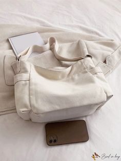 BirdinBag - Retro Canvas Shoulder Bag: Large Size, Casual Tote for Women, with Pendant, Lightweight and Versatile Beige Canvas Shoulder Bag For Daily Use, Beige Canvas Shoulder Bag For Daily Life, Casual Rectangular Hobo Bag For Daily Use, Casual Rectangular Hobo Bag For Daily Life, Casual Rectangular Satchel For Daily Life, Casual Double Handle Shoulder Bag For Daily Use, Everyday Square Canvas Bag With Zipper Closure, Daily Rectangular Canvas Bag With Adjustable Strap, Versatile Large Capacity Shoulder Bag For Daily Use