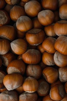 some nuts are piled up together on the table