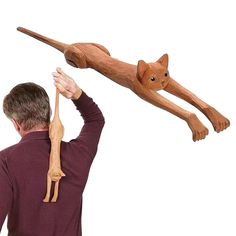 PRICES MAY VARY. 🐱 Back Scratcher Not only for massage, but also for scratching your own back unaided. Cute and fun. 45 cm long, won't scratch your skin. 🐱 Cute, cuddly and quirky, kids love it and it's so lifelike it looks just like a real cat. Even though it's made of wood, it won't have any barbs, so don't worry. 🐱 When not in use, it's also a very cute decorative piece to hang on the wall, everyone will fall in love with it at first sight, who wouldn't want to have such a cute cat tool? E Back Scratcher, Wood Cat, Wooden Cat, Massage Tools, Great Conversation Starters, Silly Cats, Your Back, Cat Memes, Things To Buy