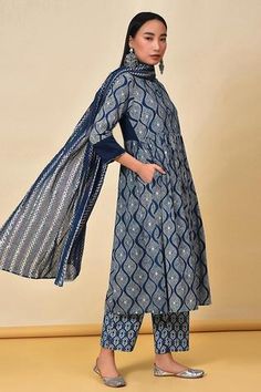 Indigo anarkali with geometric print and back embroidered bodice. Paired with dupatta and printed pyjama pant.
Component: 3
Pattern: Printed
Type Of Work: Geometric
Neckline: Mandarin 
Sleeve Type: Long Sleeves
Fabric: Cotton
Color: Blue
Other Details: 
Side pockets
Back embroidered bodice
Printed pyjama pant
Occasion: Puja - Aza Fashions Indigo Salwar Kameez With Dupatta For Navratri, Navratri Indigo Salwar Kameez With Dupatta, Indigo Anarkali Traditional Wear With Dupatta, Festive Indigo Anarkali Set With Dupatta, Indigo Anarkali Set For Festive Diwali Occasion, Indigo Anarkali Set In Chanderi, Indigo Anarkali Set For Diwali, Indigo Anarkali Traditional Wear For Navratri, Festive Indigo Anarkali Kurta