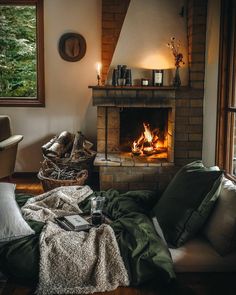 a living room filled with furniture and a fire place