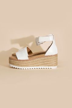 Elevate your summer style with our Espadrille Platform Sandals featuring an angled strap. These sandals combine the timeless charm of espadrilles with a modern twist, thanks to the angled strap design. With a comfortable platform sole, they offer the perfect blend of fashion and comfort for your warm-weather adventures, making them a must-have addition to your seasonal wardrobe. Toe: Open toe, round Heel shape: Platform wedge Material: Synthetic Imported Heel height: 2.8” Care Instruction: Use a Espadrilles Platform, Chic Shoes, Platform Espadrilles, 4 Inch Heels, Ankle Straps, Platform Wedges, Platform Heels, Hat Hairstyles, Platform Sandals