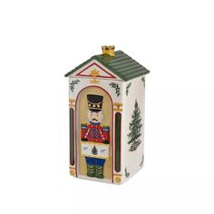 a small white box with a nutcracker on it