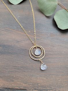 Beautiful Moonstone Pendant Necklace in your choice of Sterling Silver or 14k Gold Filled. This beauty is so versatile and can be worn with a casual t-shirt to a bridal gown!  The circles are hammered for texture and shape.  The pendant length is about 1 1/4 in. Each piece is handmade and may vary as well as the stones as they are natural. Some of the moonstone will be more white, see through, and some will have more rainbow in them than others. If you have a preference, feel free sending me a m Gold Hammered Moonstone Jewelry, Hammered Moonstone Jewelry For Gift, White Gemstone Necklace, Gemstone Lariat Necklace, Gold Geometric Necklace, Double Circle Necklace, Asymmetrical Necklace, Dainty Necklace Layered, Hexagon Necklace