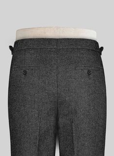 Smart gray pants are a foundational building block for your suiting wardrobe. Crafted from pure wool, the Vintage Dark Gray Weave Tweed pants are elegant and up to date choice for those in the sartorial know. 
 
 Look Includes  Vintage Dark Gray Weave Tweed Fabric  Cross Pocket  Forward 2 Pleats  Side Tabs (No Loops)- Arrow Shape  Bottom Cuff (1.5")  Two Welted Back Pockets on Trousers   
 You can change the look during customization if required. 
 
 Lining: Viscose, Dry Clean. Fabric Cross, Tweed Pants, Tweed Trousers, Gray Pants, Tweed Fabric, Grey Pants, Building Block, Up To Date, The Vintage