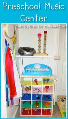 a child's play room with toys and books