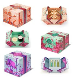 four different boxes with designs on them, one is pink and the other is green