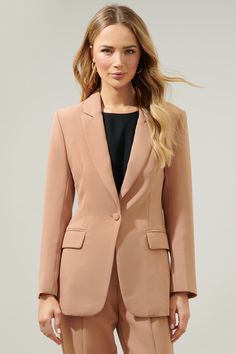 Big boss energy. Strut your stuff in this fitted blazer. Features a flattering notch lapel and a single breasted button to secure the jacket closed. It's the perfect layering jacket and can be paired with the matching vest and pants to complete a three piece suit.- Fitted - Notch lapel- Single breasted- Functional pockets- Comes in 7 colorsSize + Fit - Model is 5'9" and wearing size XS- Measurements taken from size S - Chest: 17 1/4"- Length: 29 3/4" Fabric Self:96% Polyester 4% Spandex Lining: Professional Single-breasted Notch Lapel Blazer, Professional Single Breasted Blazer With Notch Lapel, Professional Single-breasted Blazer With Notch Lapel, Professional Notched Outerwear For Office, Business Casual Solid Color Blazer With Notch Lapel, Solid Notch Lapel Blazer For Business Casual, Solid Color Blazer With Notch Lapel For Business Casual, Semi-formal Notch Lapel Professional Outerwear, Semi-formal Professional Outerwear With Notch Lapel