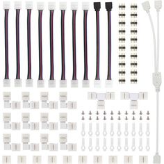 an assortment of electronic components including wires, connectors and other electrical parts on a white background