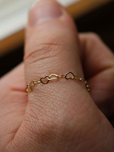 "Copy and paste into your browser, get 15% off ➔ https://bit.ly/VD15OFF The perfect dainty piece of jewelry for everyday wear, the heart chain gold ring. DETAILS: -Ring is Gold Filled -4mm in thickness You will receive one gold-filled chain ring. **Every item is handmade, this means that each will be unique and may not look EXACTLY like the picture, but it will look very similar ➡ORDER PROBLEMS If there are any problems with your order please contact me, my goal is for you to be happy with your Dainty White Gold Heart Ring, Dainty 14k Gold Stackable Heart Ring, Dainty 14k White Gold Heart Ring, Dainty Hypoallergenic Heart Ring, Dainty Stackable Yellow Gold Heart Ring, Dainty Heart Ring Gift Tarnish Resistant, Dainty Tarnish Resistant Heart Ring As Gift, Dainty 14k Gold Heart Ring For Everyday, Dainty Yellow Gold Stackable Heart Ring