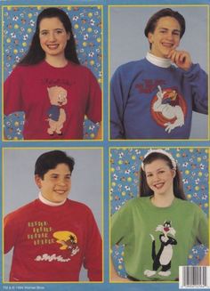 four children's sweaters with cartoon characters on them, and one boy in the middle