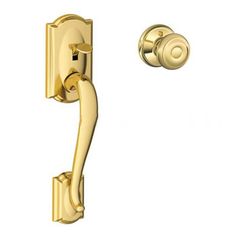 a golden door handle on a white background