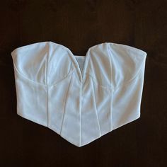 This Is A Strapless Bustier That Fits True To Size. If You Have A Larger Chest Area, I Recommend Sizing Up The Material Snatches You In! Super Cute And Comfortable. Brand New Item! Elegant Bandeau Crop Top With Boned Bodice, Fitted Cropped Tube Top For Date Night, Elegant Boned Bodice Crop Top Corset, Strapless Crop Top With Boned Bodice, Chic Crop Top With Boned Bodice And Sweetheart Neckline, Sweetheart Neckline Crop Top With Corset Back For Party, Fitted Bandage Bandeau Tube Top, White Corset Back Top For Party, Party Crop Top With Corset Back And Sweetheart Neckline