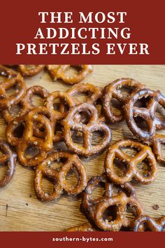 some pretzels are sitting on top of a cutting board with the words, the most adding pretzels ever