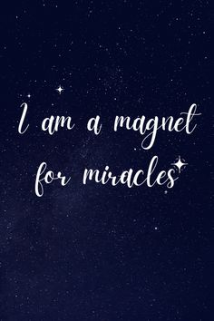 the words i am a magnet for miracles are written in white ink on a dark blue background