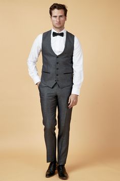 This men's single-breasted waistcoat combines timeless style with modern sophistication. Featuring a silk-style button trail, silk style welt pockets in a single-breasted design, this smart evening waistcoat is a must-have for formal occasions. Model wears size 40R. Features Slim fit Single-breasted Five button fastening Adjuster straps Complimentary pocket square Style Tip | Wear the full suit with a classic bow tie and black shoes. Matching accessories Bubble Tie set in Grey Composition Main: Tailored Single Button Vest For Semi-formal Occasions, Elegant Semi-formal Vest With Pockets, Formal Single Breasted Vest With Suit Collar, Formal Single-breasted Suit Collar Vest, Formal Single-breasted Vest With Suit Collar, Elegant Tailored Vest With Pockets, Sleeveless Blazer With Pockets For Formal Occasions, Classic Nehru Jacket With Pockets For Formal Occasions, Semi-formal Slim Fit Single Breasted Vest