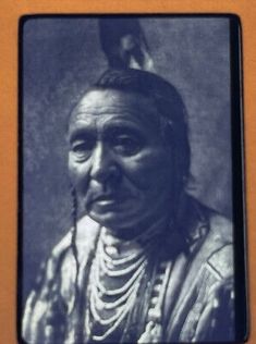 an old photo of a native american man