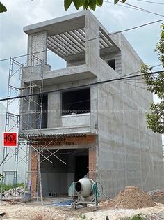 a building under construction with scaffolding around it