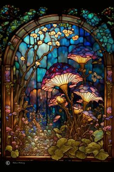 a stained glass window with flowers and butterflies