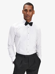 Men’s tuxedo shirts – white tuxedo shirt french cuffs.
The great celebrations in your life leave little room for compromise. Our classic white tuxedo shirt is a mix of elegance and contemporary style in perfect balance. 

Timeless details such as the evening cut away collar, black stud buttons and French cuffs create a perfect black-tie shirt. Removable stud buttons. White Tuxedo For Black Tie Event, Classic White Tuxedo For Black Tie Events, Classic White Tuxedo For Black-tie Events, Classic White Tuxedo For Business, Classic White Tuxedo For Formal Occasions, Formal Tuxedo Dress Shirt With Long Sleeves, Timeless White Tuxedo For Business, Fitted Tuxedo Shirt For Formal Occasions, Formal Fitted Tuxedo Shirt