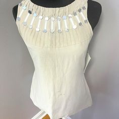 Beautiful Casual Cream Blouse Embellished With Small Circular Mirrors Across Neckline On Front And Back. Zipper Back. Size 2. No Known Flaws, Never Worn. Stretch Sleeveless Top With Contrast Trim, Beige Embellished Sleeveless Top, Vintage Embellished Sleeveless Top, Embellished Fitted V-neck Tank Top, Spring Embellished V-neck Tank Top, Cream Blouse, Circular Mirror, Tory Burch, Sleeveless Top