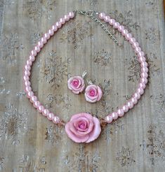 "Floral pink rose necklace, Pearl Wedding necklace, bridesmaids jewelry Size of the roses 1,5\" / 3,5сm/; the necklace length is 16\" /40cm/ Keep the jewellery away from perfume and other alcohol containing fluids because the alcohol damages the Polymer clay. Store the fragile items in separate boxes and treat them with care. Misuse may result in damage. Visit my shop https://www.etsy.com/shop/JewelryByCompliment?ref=hdr_shop_menu If you have any questions, please contact me! Thank you for your Feminine Rose Jewelry For Valentine's Day, Feminine Rose Design Flower Necklace, Feminine Pink Jewelry With Handmade Flowers, Handmade Pink Bridal Necklace For Wedding, Pink Flower-shaped Necklaces For Mother's Day, Pink Flower Necklace For Mother's Day, Rose Flower Jewelry For Jewelry Making, Pink Rose Design Jewelry For Valentine's Day, Rose Flower Pendant Necklace For Wedding