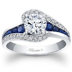 a diamond and blue sapphire engagement ring