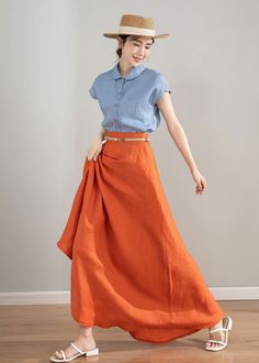 "This orange A-line linen midi skirt is made from high-quality linen material, which is soft, comfortable, and breathable. The bright and vibrant color makes you stand out in the crowd. The wide hemline adds an elegant and flowing movement to your look. The high-waisted design highlights your waistline, creating a flattering silhouette. Pair it with a lace top or a loose-fitting t-shirt to create different fashion styles. This skirt is suitable for various occasions such as dates, parties, and v Long Orange Skirt, Flowy Long Skirt, Custom Skirt, Midi Skirts Summer, Linen Midi Skirt, Skirt Flowy, Long Flowy Skirt, Linen Summer, Orange Skirt