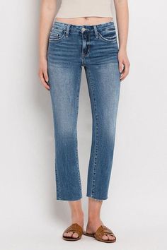 Elevate your denim game with our Mid Rise Slim Straight Jeans, the perfect blend of comfort and style for the modern woman. These versatile jeans offer a flattering mid-rise waist and a slim straight leg that elongates your silhouette, making them an essential addition to your wardrobe. Key Features: • Mid-rise waist for comfort and coverage • Slim straight leg for a sleek, timeless look • Medium wash for versatile styling • Clean cut raw hem adds a contemporary edge • Cropped length perfect for Midnight In Paris, Slim Straight Jeans, Co Ord Set, Clean Cut, Night Looks, Straight Jeans, Modern Woman, Sweater Top, The Modern