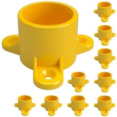 a yellow cup is surrounded by eight cups and one has several holes in the middle