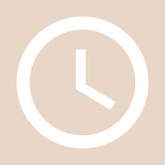 a white clock on a beige background