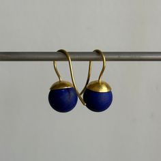 Timelessly regal lapis is crowned by 22k gold in these alluring earrings. 22k yellow gold Lapis 11mm (7/16") in diameterEarrings hang 7/8" from the ear Each earring weighs 2.8g Lapis Earrings, Newport Ri, 22k Gold, Newport, Fine Jewelry, Yellow Gold, Yellow, Gold