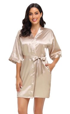 PRICES MAY VARY. Light and sleek fabric to accentuate curves; Smooth to the touch and easy on the skin. Featuring kimono oblique V neck,half sleeves,side pockets. Inside ties to keep the robe closed and exterior matching belt to keep firmly. Solid color tone kimono robes. Simple yet fashionable and elegant soft robes for women. Available in multiple colors,perfect for weddings,spa party,gifts,or everyday wear. Solid Bridesmaid Robes,Women's Silky Kimono Bathrobes for Bride,Wedding Party Loungewe Kentucky Derby Fashion, Gifts 2021, Bridesmaid Kimono, Bridesmaid Robes Floral, Derby Fashion, Wedding Shower Party, Bridal Kimono, Satin Robes, Robe Wedding