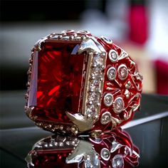 Our 925 sterling silver ring is real red enamel.  Baroque Rococo. It has real red ice crushed radiant stone on it. It was hand carved in the baroque rococo style. It weighs about 35-40 grams. Gift men ring. For men.Red enamel ring. Men Silver Ring, Red Enamel Ring, Red Zircon Ring, 925K Silver Men Ring, Vintage Men Ring, Handmade Silver Ring, Baroque, Gift For Him, Gift For Boyfriend PRODUCT DETAILS * Made to Order * Certified 925 sterling silver * Your ring comes in a pretty ring box ready for Luxury Men's Polished Ruby Ring, Luxury Men's Ruby Promise Ring, Luxury Handmade Ruby Men's Ring, Collectible Red Ruby Ring With Polished Finish, Unique Red Ruby Ring Collectible, Collectible Red Ruby Rings, Unique Red Ruby Ring For Collectors, Collectible Red Ruby Jewelry, Red Polished Finish Signet Ring As Gift