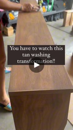 a woman standing next to a wooden bench with the words you have to watch this tan washing transformation