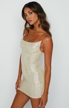 Material:95%Polyester+5%Spandex -When you want to look good, feel good, and turn heads, then our strapless mini is your perfect go-to. Pair with black sandals, drop a pair of shades into your handbag, and you're ready for anything. -Enjoy a perfect summer day in this Sexy Sequins Straps Sleeveless Mini Dress. Cut at the waistline, is perfect for pairing with your favorite heels, wedges, or flats.  -It is great for showing off a killer pair of legs or bronzed shoulders. T-shaped straps are delica New Years Eve Looks, Cami Bodycon Dress, Gold Mini Dress, Glitter Mini Dress, Embroidery Skirt, Date Dresses, Mini Dresses Online, Costume Intero, Beginning Boutique