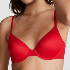 Victoria’s Secret Pink Wear Everywhere Lightly Lined T-Shirt Bra In Pepper Red. An Everyday Essential With A Super-Comfy Fit And Flattering Lined Cups That Provide Natural Shape-What's Not To Love? Lightly Lined, Full Coverage. Structured, Underwire Cups. Fully Adjustable Straps Wear Classic Or Cross-Back. Hook-And-Eye Back Closure. Partially Made From Recycled Materials. Size Is 34c, Color Is Pepper Red. New In Package, Retails For $36.95. T Shirt Bra, Natural Shapes, Red Peppers, Comfy Fits, Recycled Materials, Secret Pink, Women's Intimates, Victoria’s Secret, Red Color