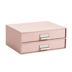 a pink box with two drawers on it