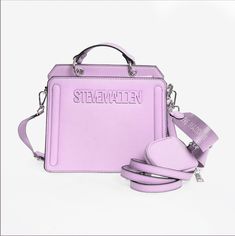 Steve Madden Beverlyn gentle lavender bag Briona Steve Madden, Steve Madden Bwilde Flat Tote, Steve Madden Burgent Bag, Purple Square Bags For Daily Use, Trendy Purple Bag With Detachable Handle, Trendy Purple Bags With Detachable Handle, Trendy Purple Satchel With Removable Pouch, Purple Square Bag With Adjustable Strap, Trendy Purple Rectangular Shoulder Bag