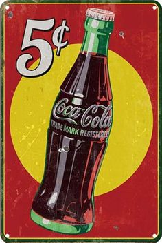 an old metal sign advertising coca cola