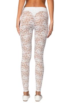 These lacy legging are soft and stretchy and add floral charm to any outfit. 95% polyester, 5% spandex Machine wash, dry flat Imported Spring Lace Stretch Tights, Spring Loungewear Footless Bottoms, Summer Loungewear Leggings, White Footless Legwear For Spring, Stretch Lace Bottoms For Loungewear, Stretch Lace Full-length Pants, Full-length Lace Bottoms With Stretch, Full Length Lace Bottoms With Stretch, Full Length Bottoms With Lace Trim For Spring