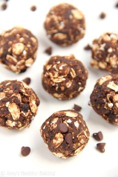 chocolate chip cookies with oats and nuts on a white plate, ready to be eaten